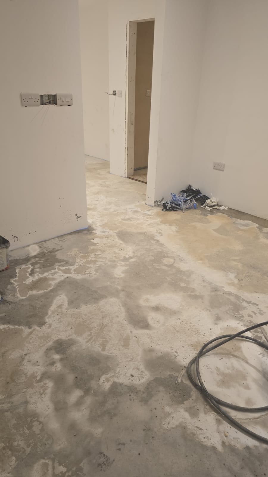 Stripped interior prepped for flooring and finishing